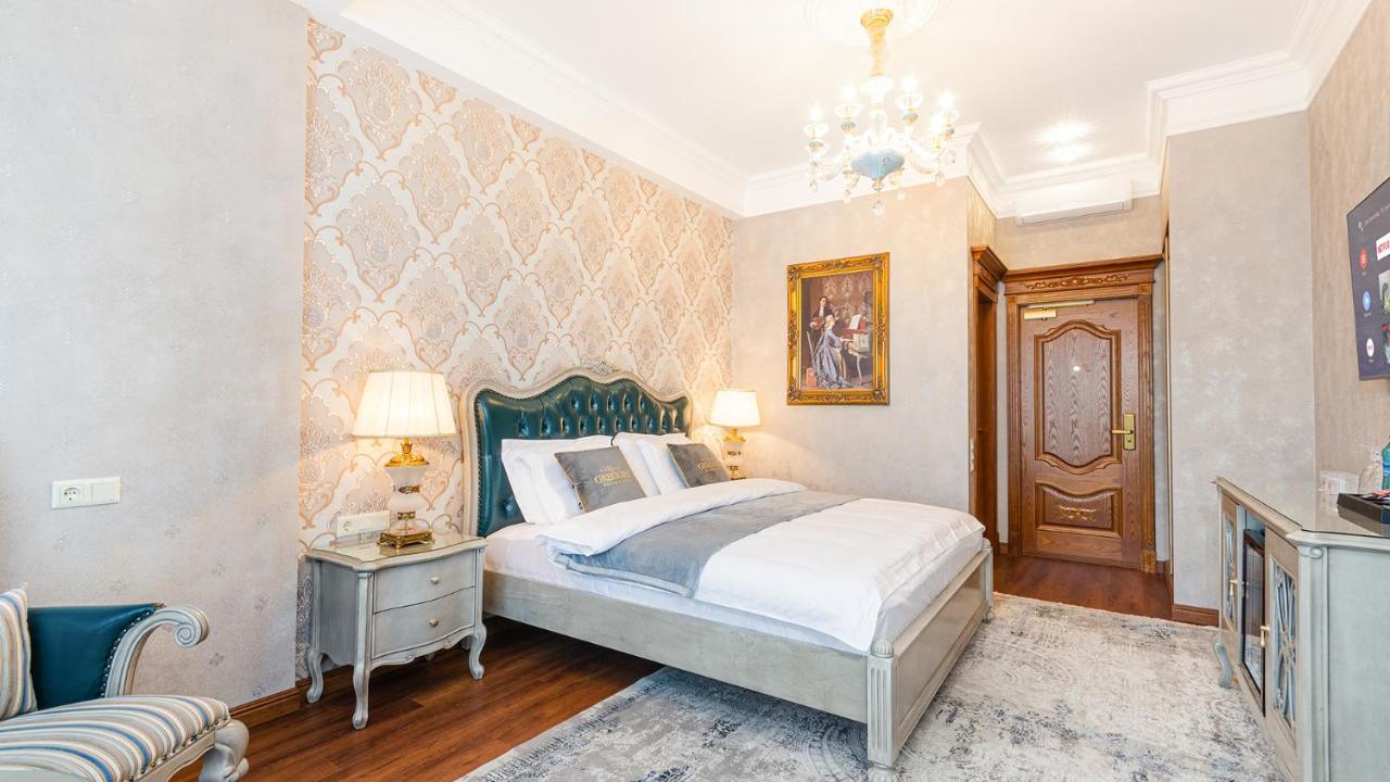 Gregory Boutique Hotel Chişinǎu Buitenkant foto A bedroom